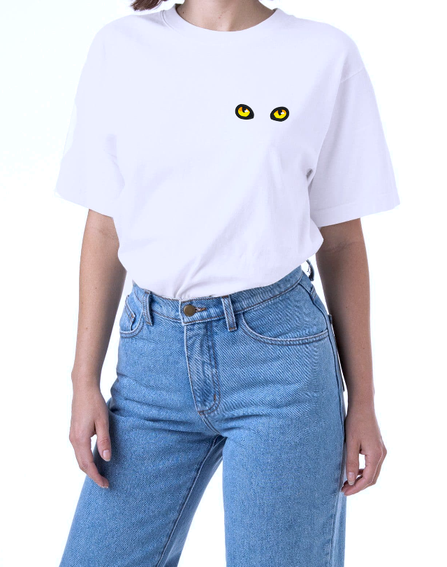 Yellow Cat Eyes on a White T-Shirt